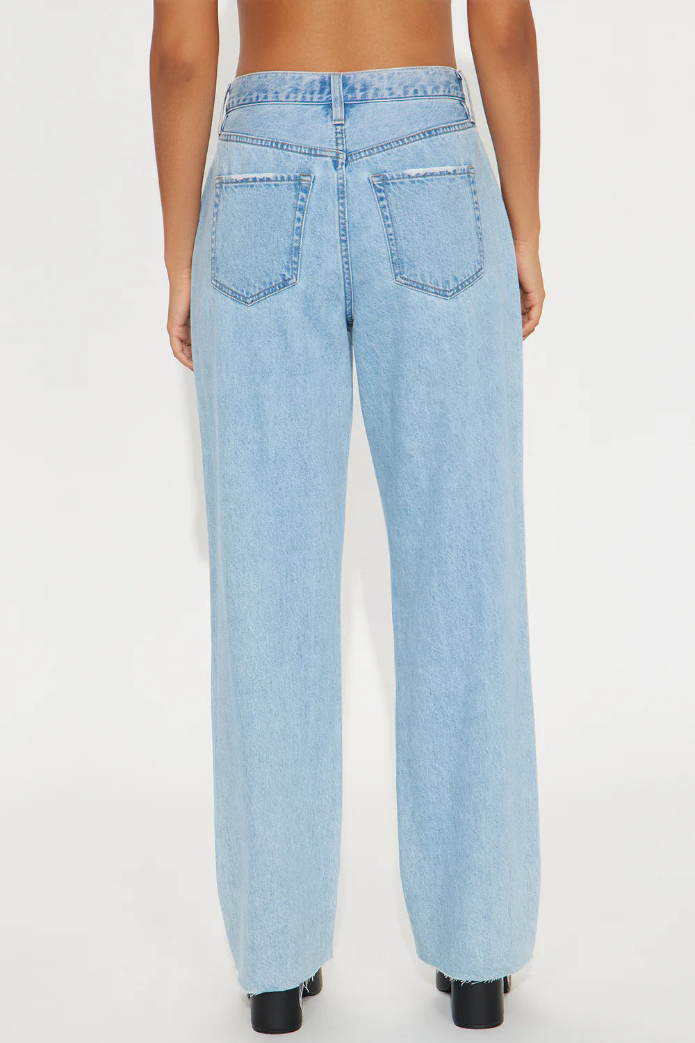 Light wash 90s petite wide leg jeans with relaxed vintage streetwear styling