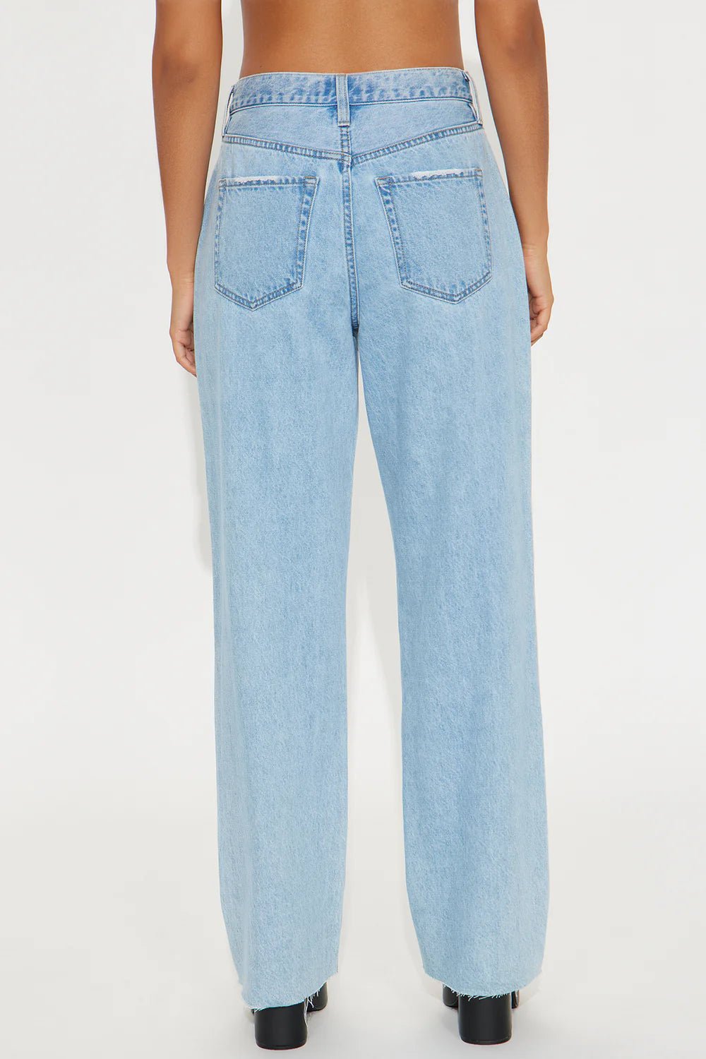 Light wash 90s petite wide leg jeans with relaxed vintage streetwear styling