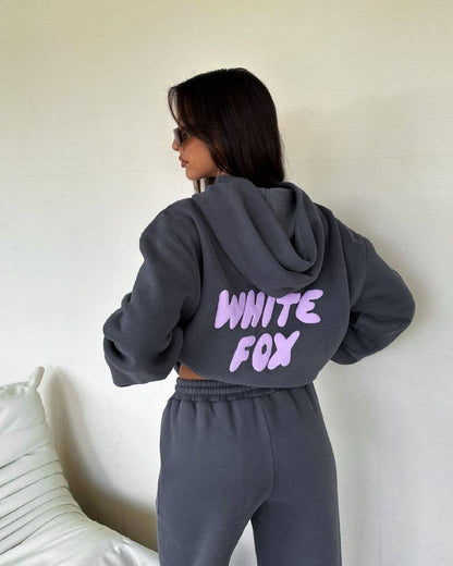 Oversized navy hoodie and jogger sweat set with relaxed casual streetwear styling