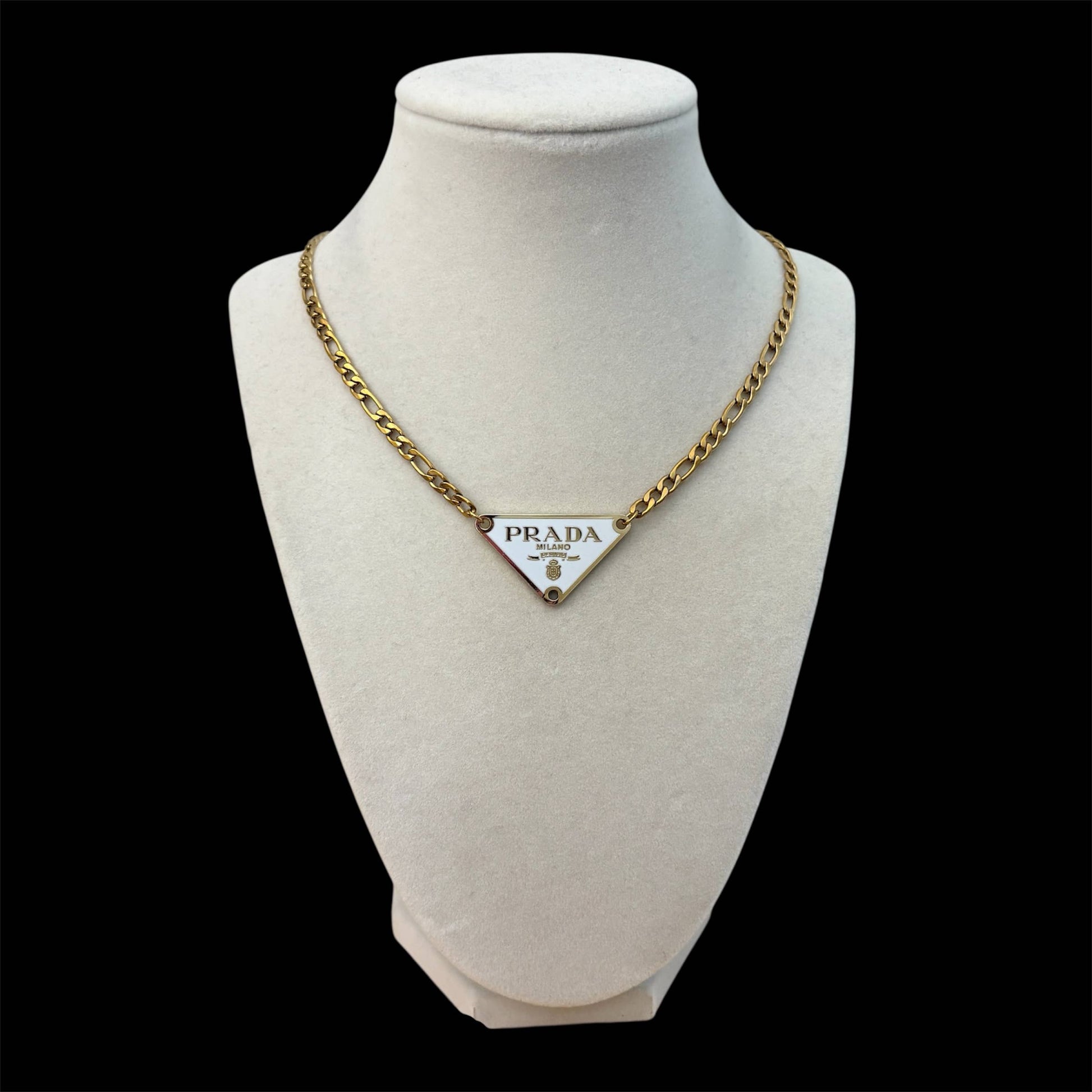 Repurposed white triangle pendant necklace with gold chain and luxury inspired minimalist styling