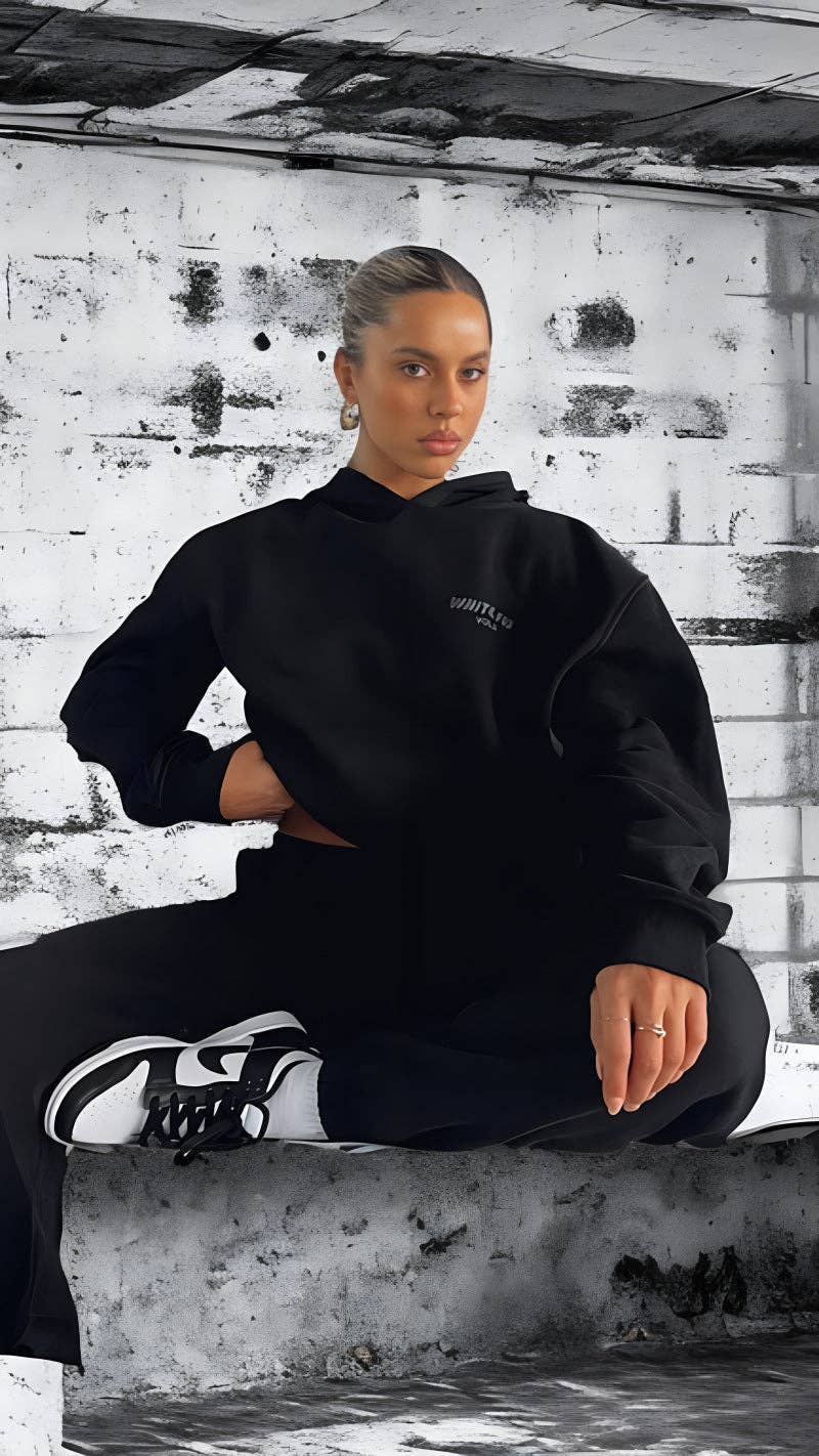 Oversized navy hoodie and jogger sweat set with relaxed casual streetwear styling