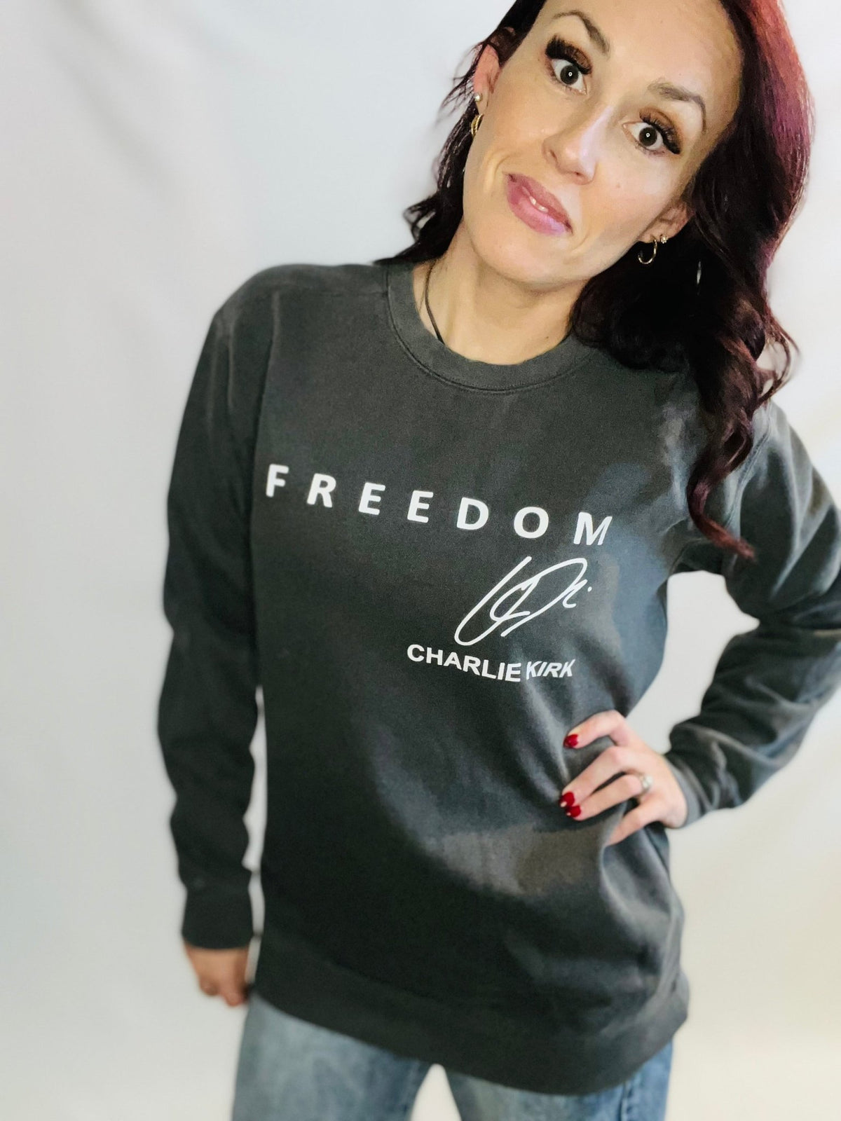 Vintage wash graphic crewneck sweatshirt with relaxed casual streetwear styling
