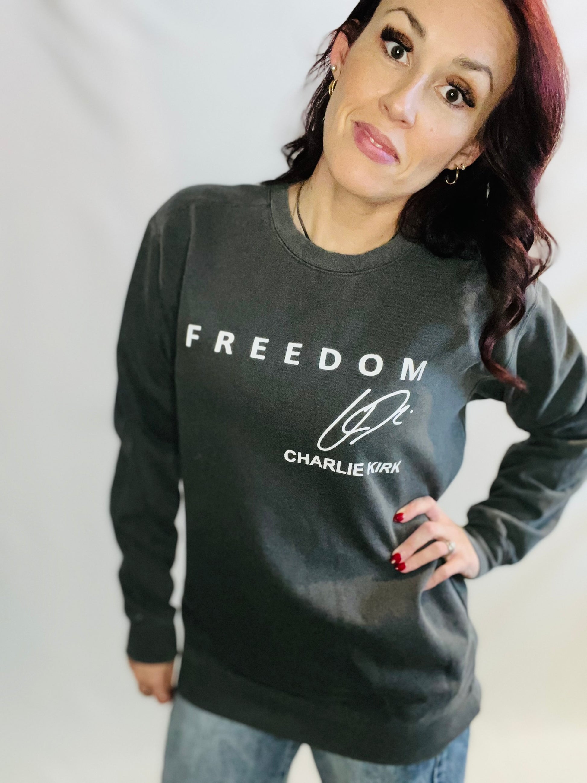 Vintage wash graphic crewneck sweatshirt with relaxed casual streetwear styling