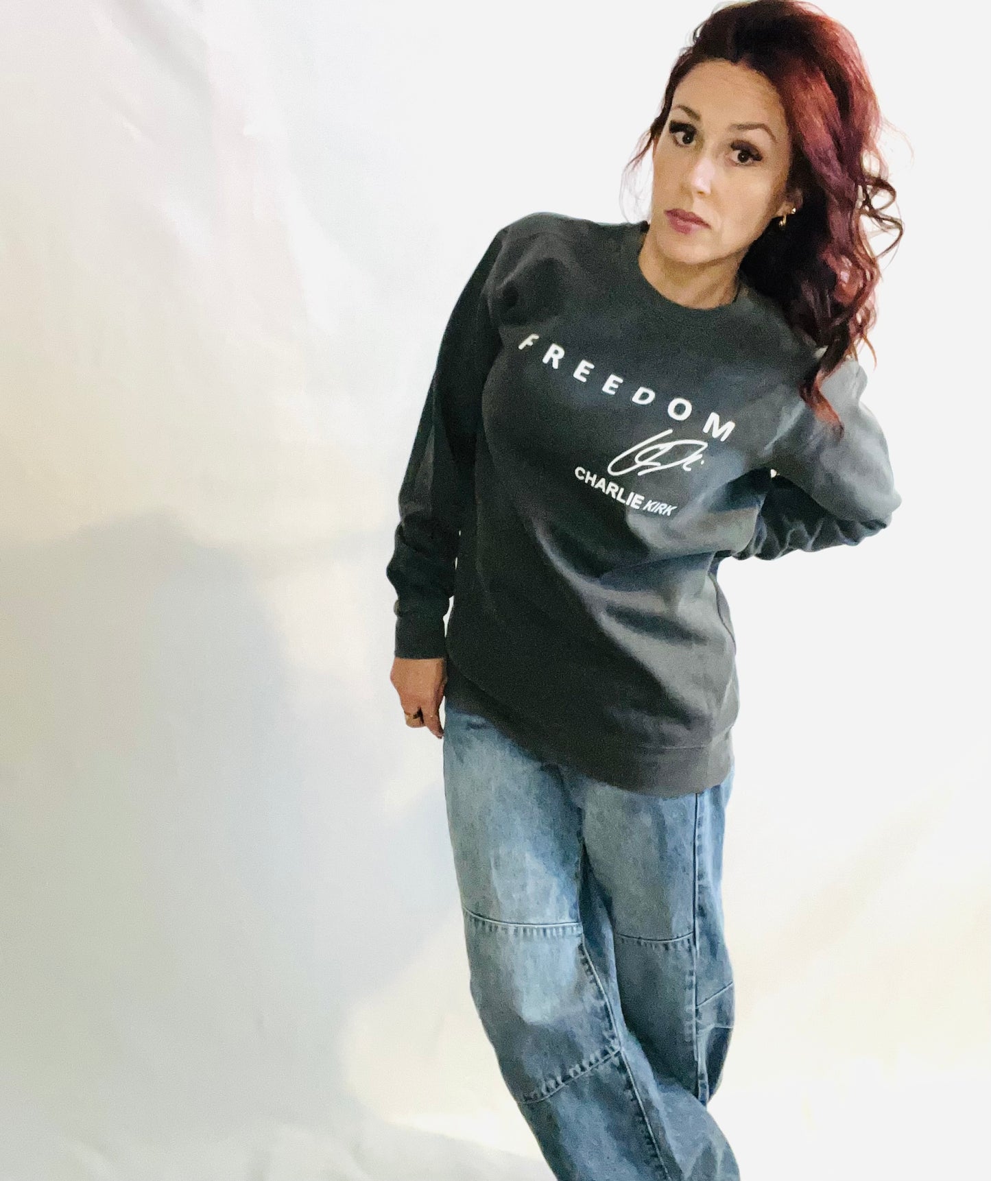Vintage wash graphic crewneck sweatshirt with relaxed casual streetwear styling