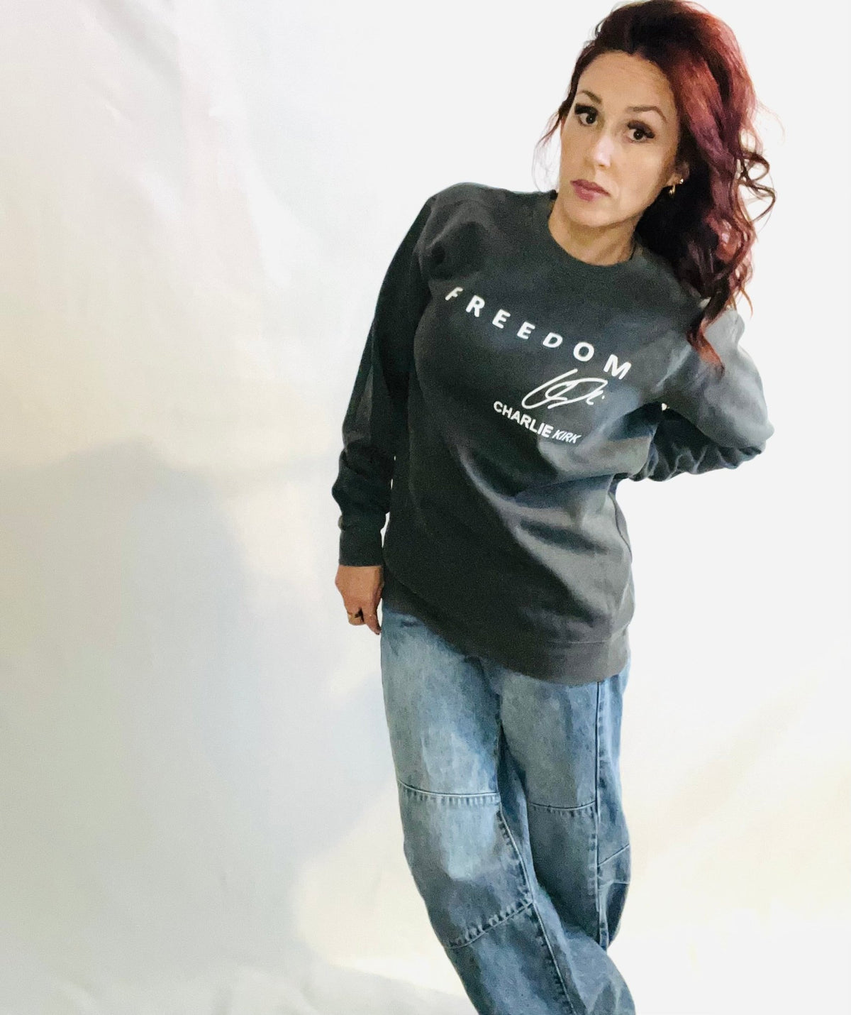 Vintage wash graphic crewneck sweatshirt with relaxed casual streetwear styling