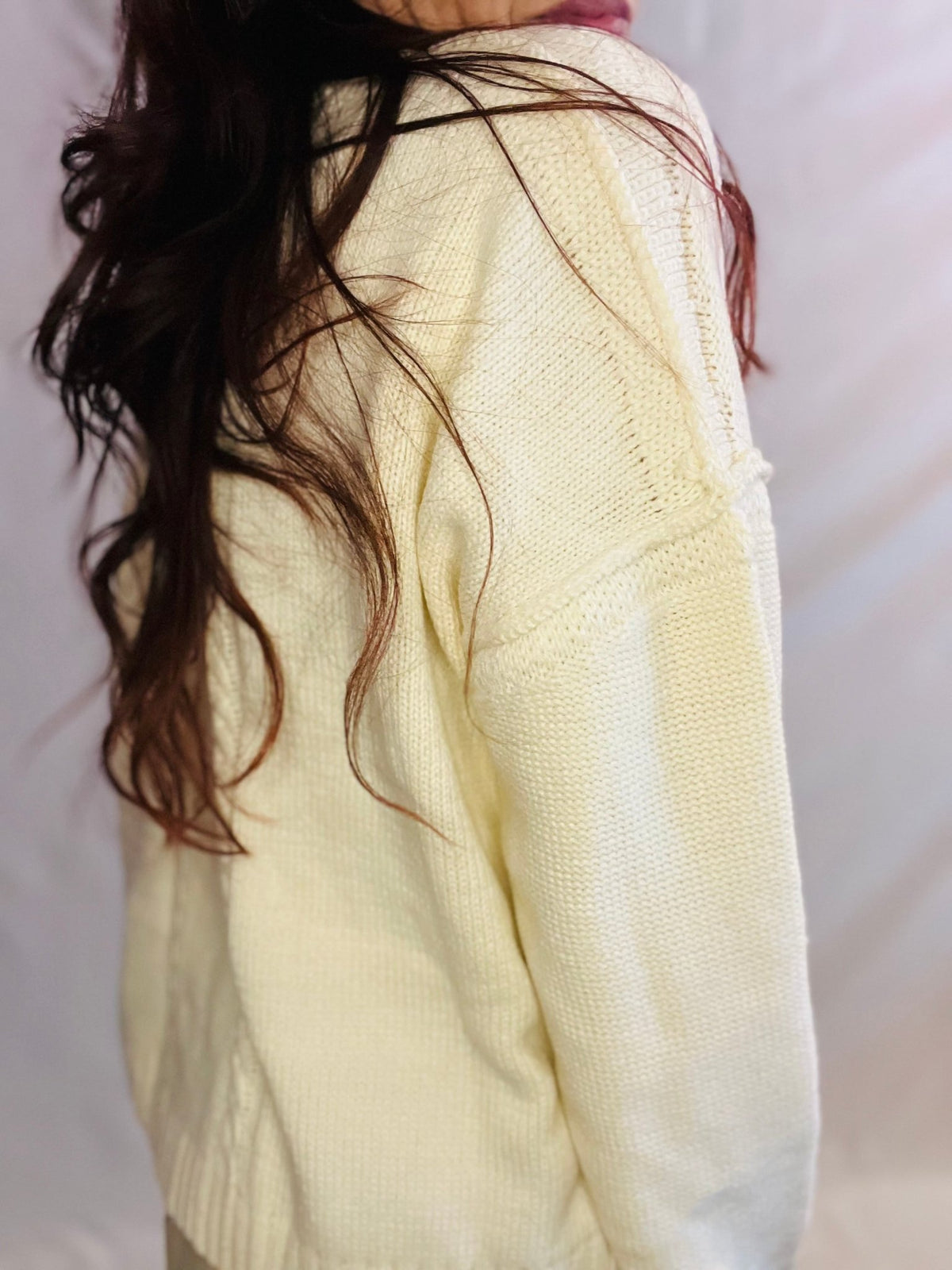 Cream oversized knit sweater with black 87 graphic and casual streetwear styling