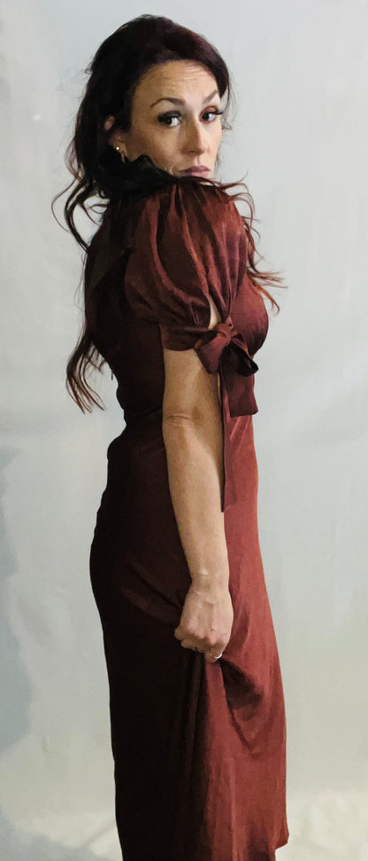 Chocolate brown satin midi dress with lace trim and feminine romantic styling