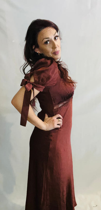 Chocolate brown satin midi dress with lace trim and feminine romantic styling