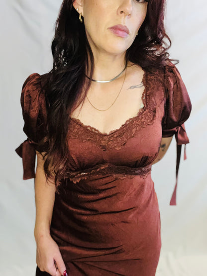 Chocolate brown satin midi dress with lace trim and feminine romantic styling