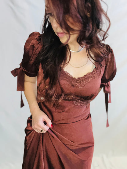 Chocolate brown satin midi dress with lace trim and feminine romantic styling