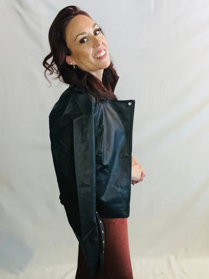Black faux leather moto jacket with edgy minimalist streetwear styling for women