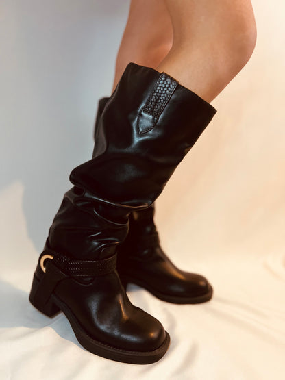 Black slouchy moto boots with chunky heel and edgy modern grunge streetwear styling