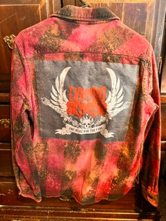 Oversized vintage plaid flannel jacket with custom Lynyrd inspired graphic patch and distressed streetwear styling
