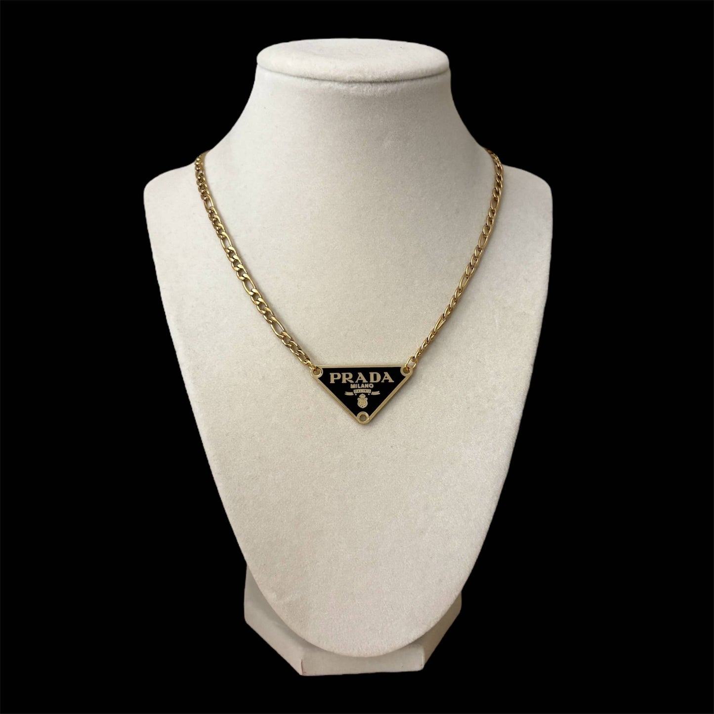 Repurposed luxury inspired triangle pendant necklace with gold chain and black enamel detail