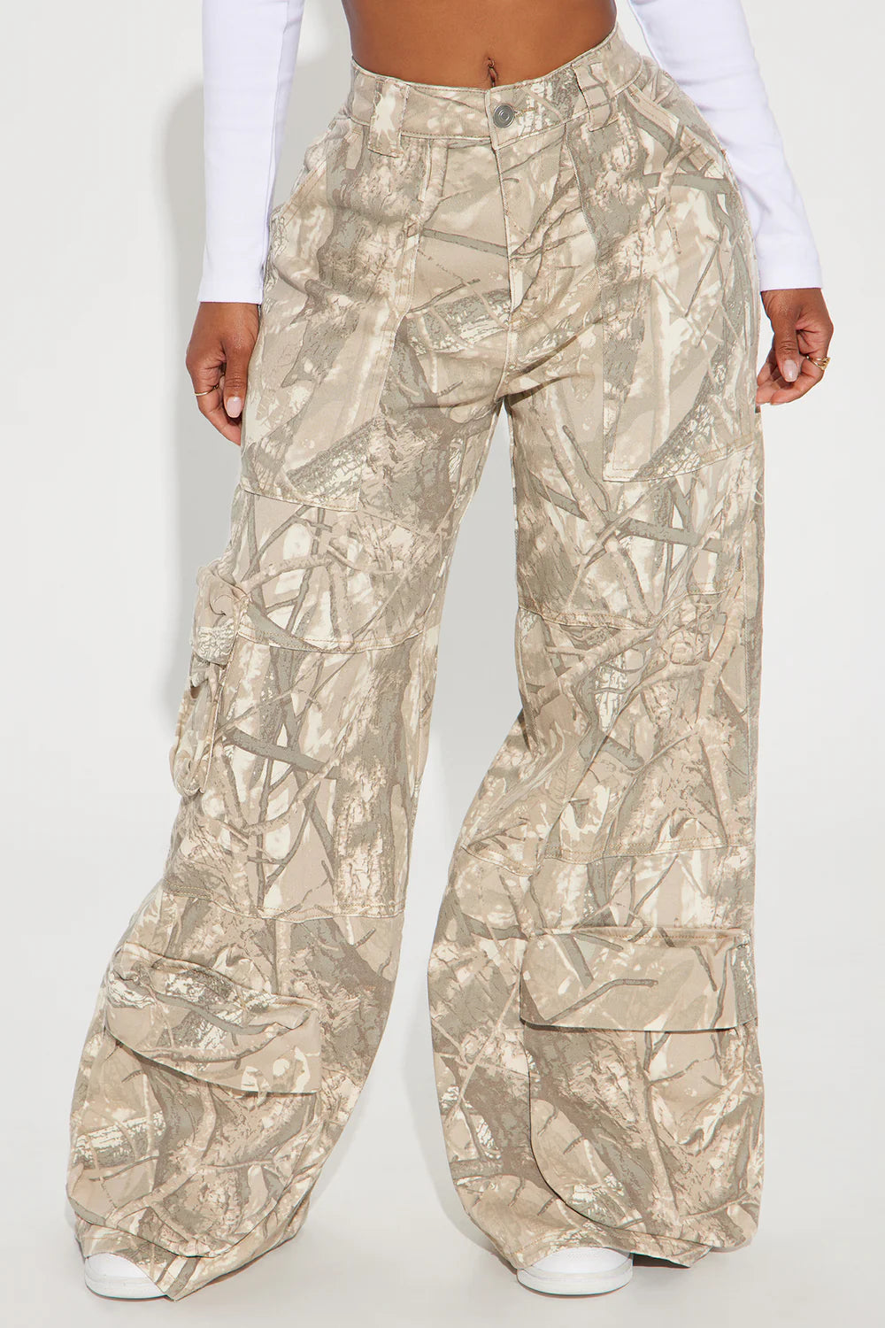 Neutral camouflage wide leg cargo pants with oversized streetwear utility styling
