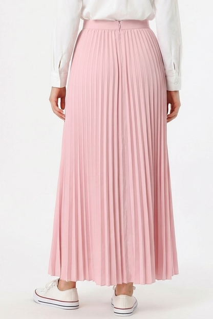 Blush pink pleated maxi skirt for women with modest feminine minimalist styling