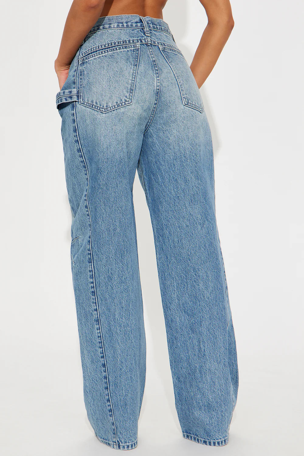 Light wash wide leg carpenter jeans with relaxed oversized streetwear styling