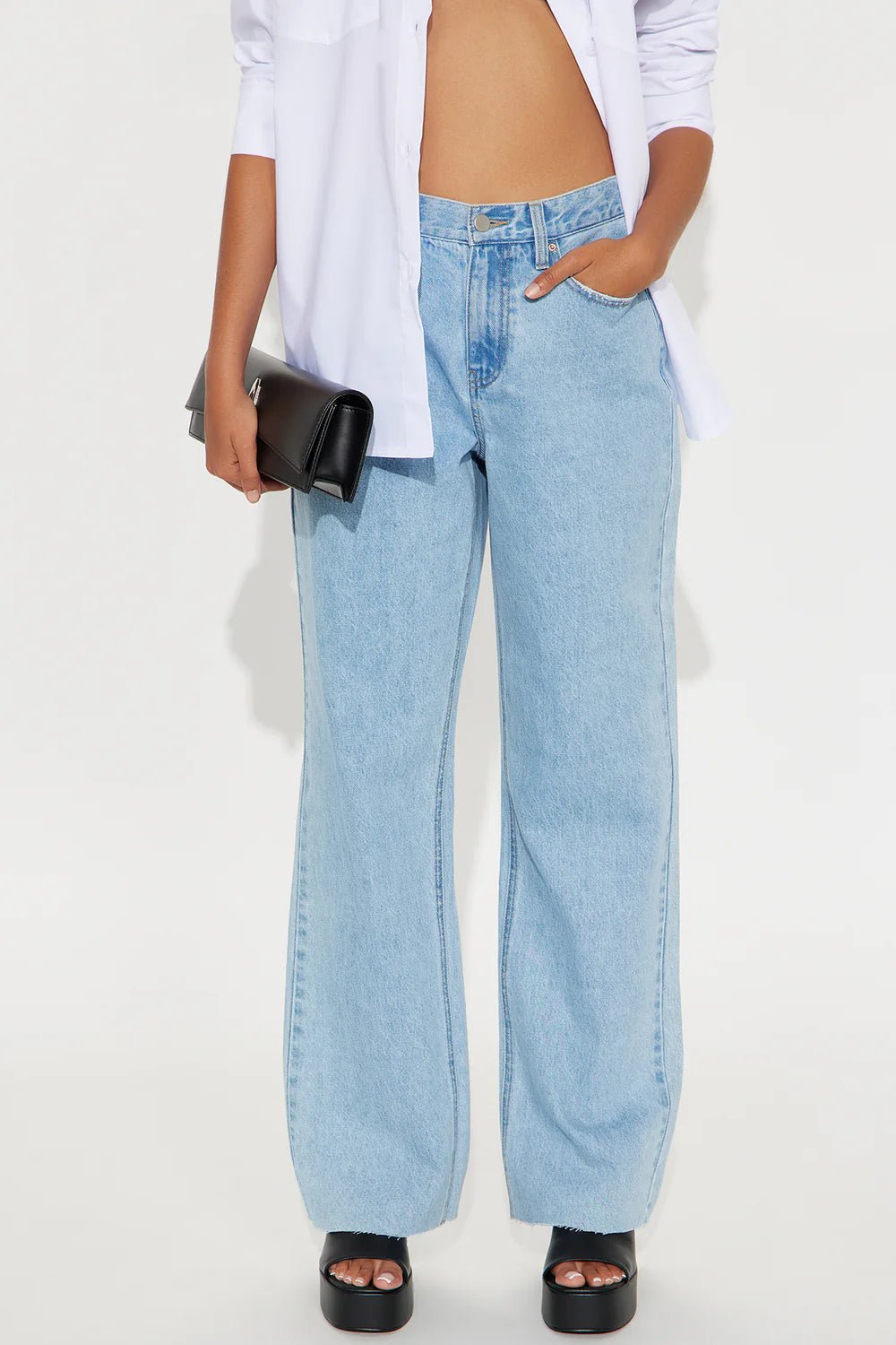 Light wash 90s petite wide leg jeans with relaxed vintage streetwear styling