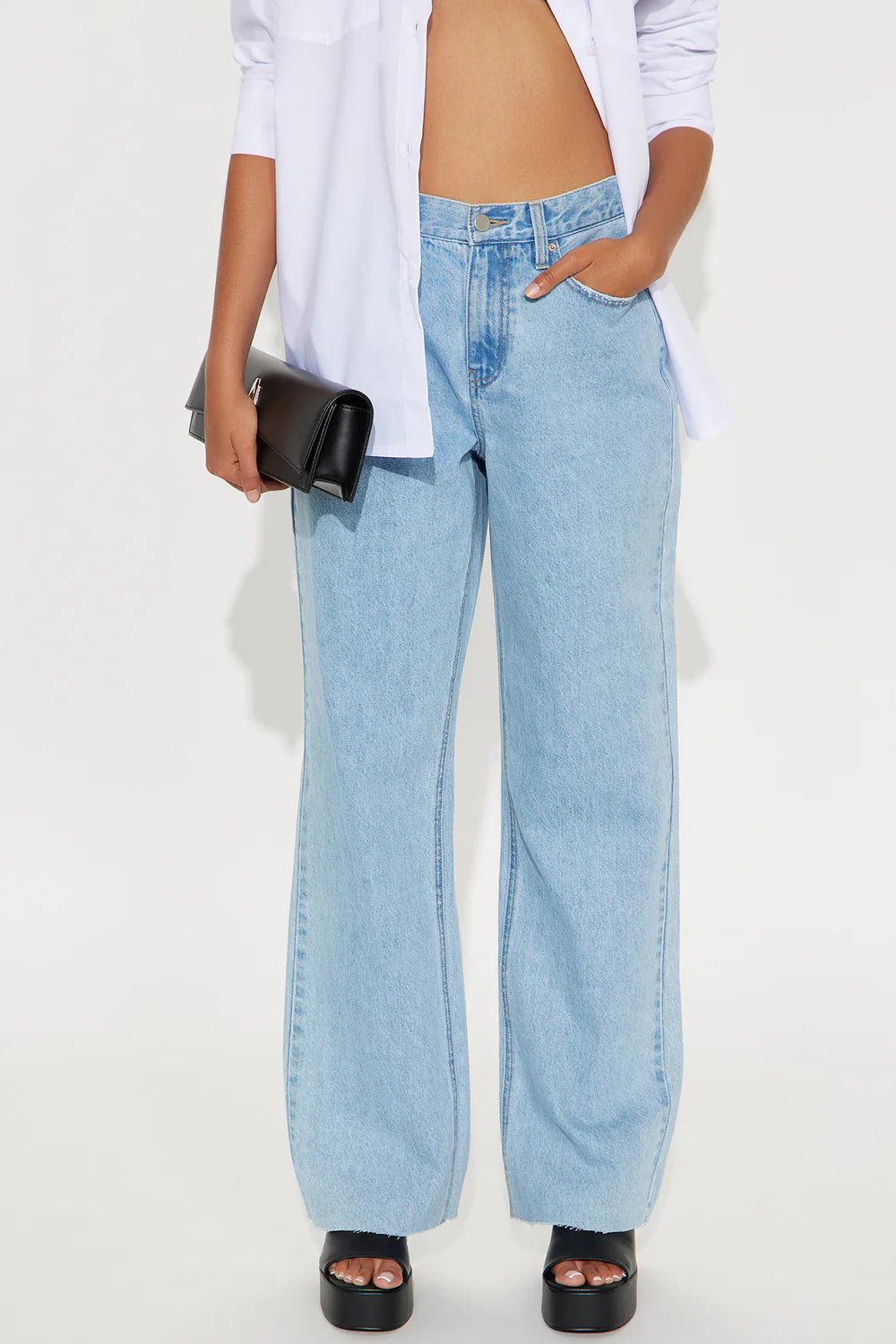 Light wash 90s petite wide leg jeans with relaxed vintage streetwear styling
