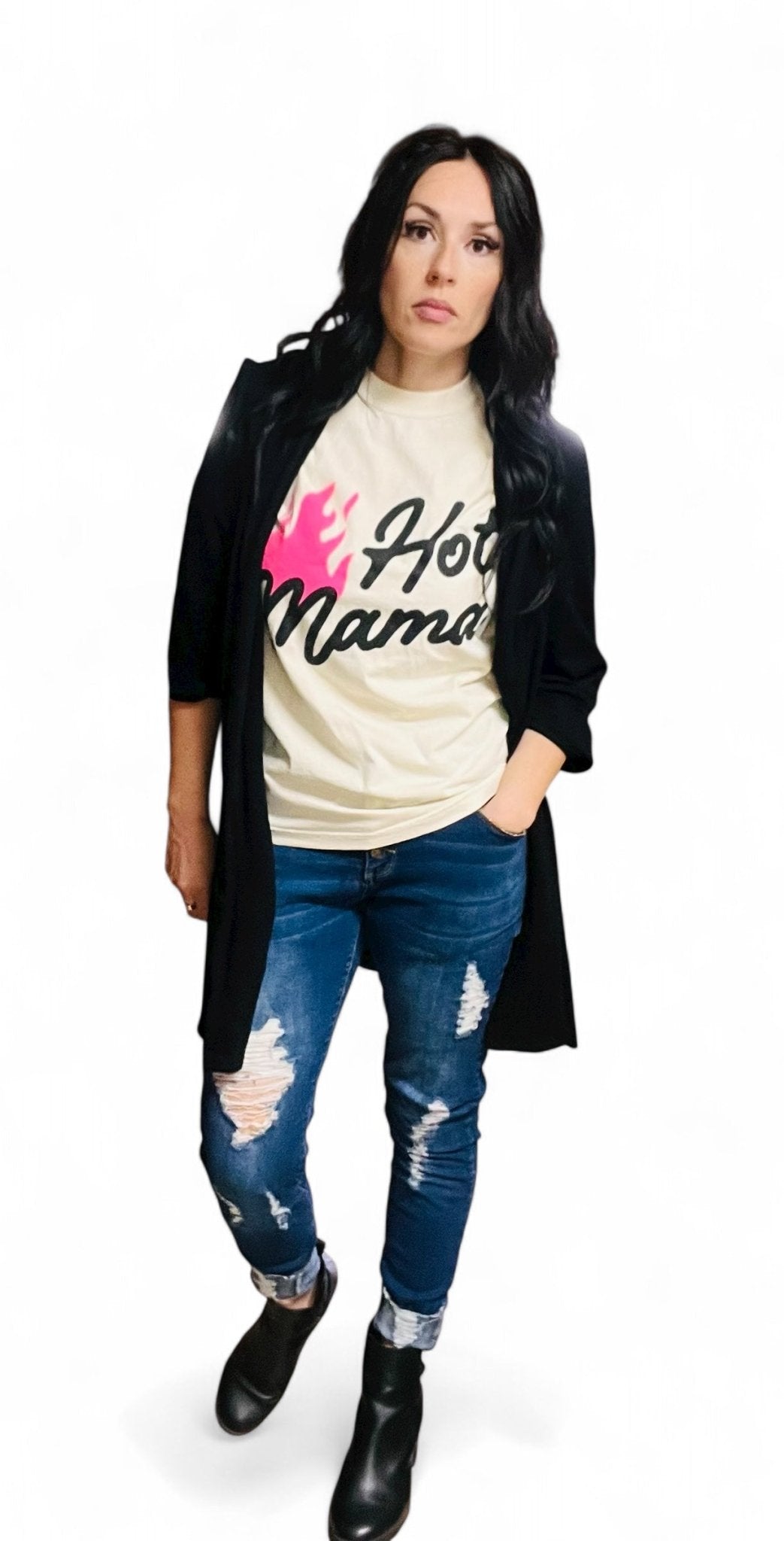 Woman wearing a graphic t-shirt with text and design, standing against a white background